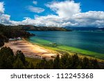 The beautiful deep green and blue colors of Lake Tota.