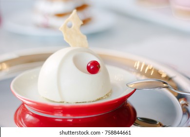 Beautiful and delicious panna cotta on red plate - Shutterstock ID 758844661