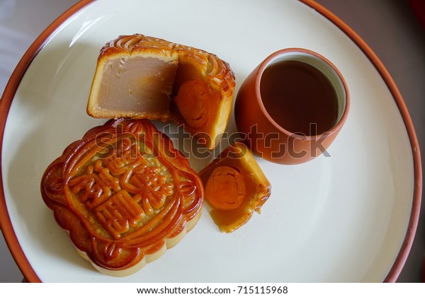 Beautiful delicious\
tradition moon cake  with double egg yolk and green bean paste with\
\