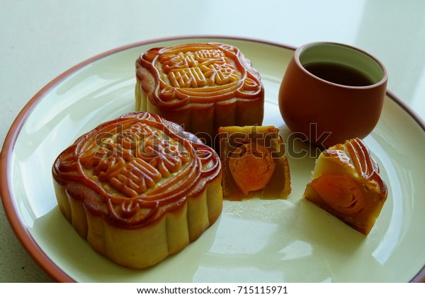 Beautiful delicious\
tradition moon cake  with double egg yolk and green bean paste with\
\