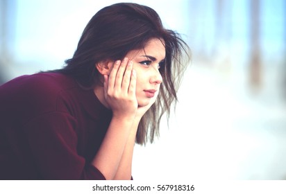 Beautiful Depressed Woman Outdoor. Pensive Teen Girl