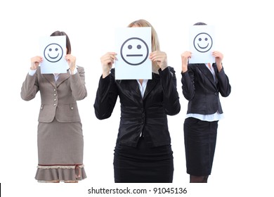 A beautiful depressed young business women hiding behind a smiley face