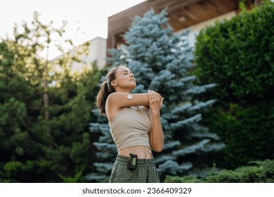 Beautiful diabetic woman preparing for outdoor run in the city. - Powered by Shutterstock