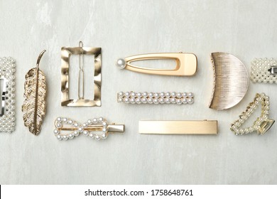 Beautiful Different Hair Clips On White Table, Flat Lay