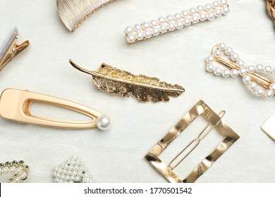 Beautiful Different Hair Clips On White Table, Flat Lay