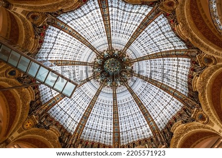 Beautiful dome in Galeries Lafayette in Paris, France. Art nouveau or Art deco style stained glass