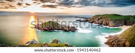 Beautiful Donegal Murder Hole Panorama beach sea view in Ireland ocean Coast. Atlantic cliffs and rocks. Beautiful landscape nature.