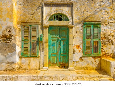 the beautiful door from an old house in Symi island in Greece