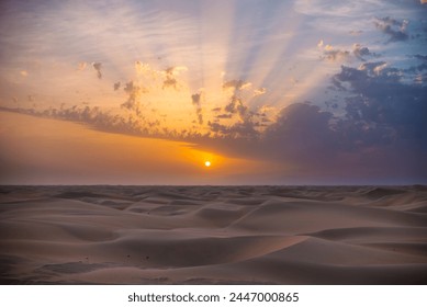 Beautiful dramatic clouds sunset sunrise over the desert sand dune - Powered by Shutterstock