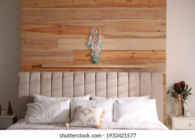 Beautiful Dream Catcher Hanging Above Bed In Stylish Room Interior