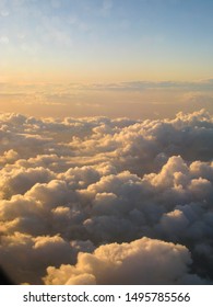 Beautiful And Dreamy Clouds And Cloud Formations Photographed From Above During Sunset / Dawn.