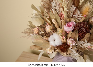 Beautiful Dried Flower Bouquet In Vase On Table, Closeup