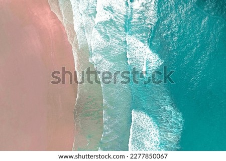 Similar – Luftaufnahme Panoramadrohne Blick auf den blauen Ozean Wellen, die am Sandstrand in Portugal erdrücken.