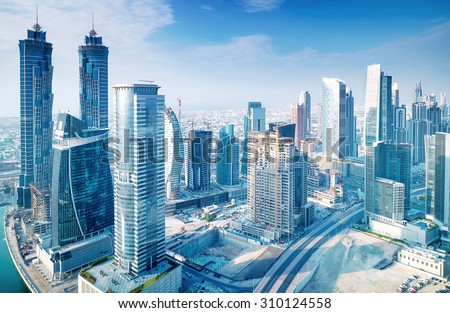 Beautiful Dubai city, bird eye view on majestic cityscape with modern new buildings, daytime panoramic scene, United Arab Emirates