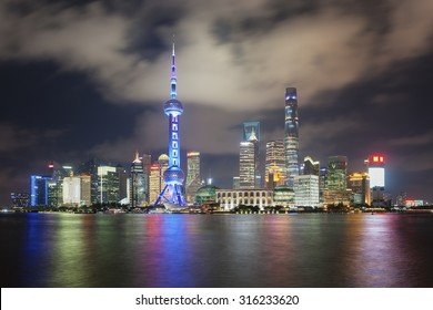 Beautiful Dusk Scene Of Shanghai Skyline And Huangpu River At Night, China