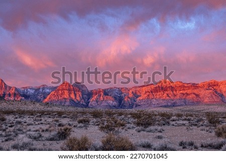 Beautiful early morning light bounces off the mountains of Red Rock Canyon in Las vegas, hence the name sake.