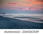 A beautiful early morning sky at Myrtle Beach, SC with the Apache Pier in the background