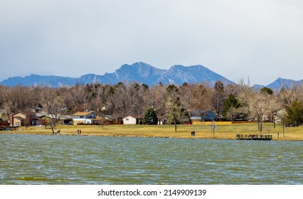 Beautiful early spring landscape with the Rocky Mountains in the distance in Lake Arbor Park, Denver, Colorado