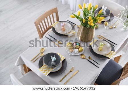 Elegant Easter table setting with pastel accents