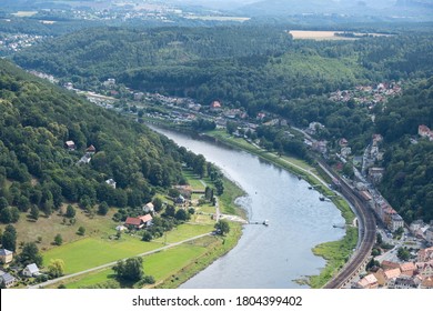 the beautiful Elbe river flows along small towns, mountainous terrain and rich vegetation