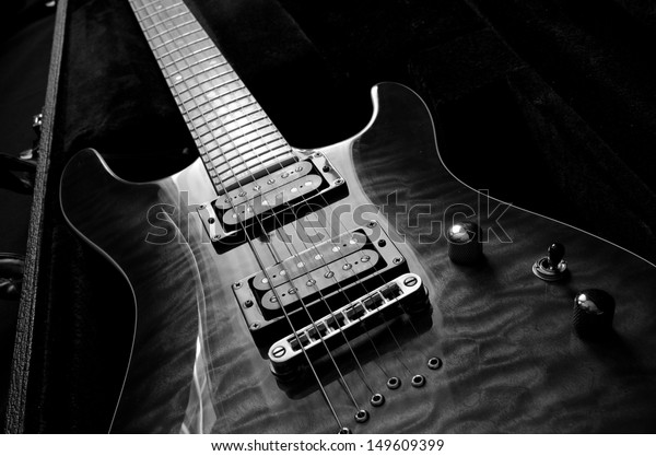 a beautiful\
electric guitar in a hard\
case