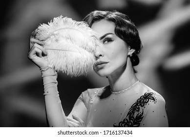 Beautiful Elegant Hollywood Woman In Vintage Dress Holding White Feather