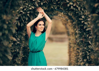 Beautiful Elegant Woman Attending Formal Party In The Garden - Lovely  Girl Wearing Green Dress At Formal Outdoor Ceremony 
