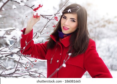 Beautiful Elegant Woman In Red Coat. Winter Nature