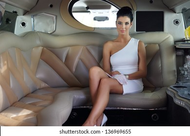 https://image.shutterstock.com/image-photo/beautiful-elegant-woman-sitting-luxury-260nw-136969655.jpg