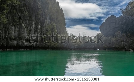 Similar – Image, Stock Photo Miniloc Island with limestone cliffs. Aerial drone panoramic picture. Bacuit Archipelago, El Nido, Palawan, Philippines