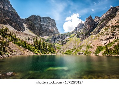 Beautiful Emerald Lake in Rocky Mountains, Colorado, Hallett Peak and Flattop Mountain in the background and some green trees. 