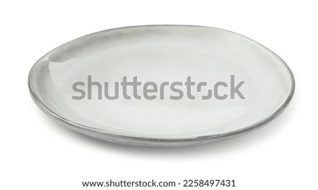 Beautiful empty ceramic plate isolated on white