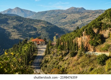 Beautiful Empty Mountain Roadway. Colorful Landscape With Road Through The Woods In Autumn. Travel In Greece. Road Trip. 