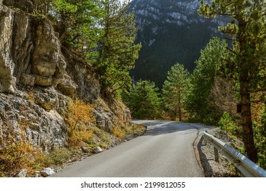 Beautiful Empty Mountain Roadway. Colorful Landscape With Road Through The Woods In Autumn. Travel In Greece. Road Trip. 