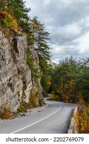 Beautiful Empty Mountain Roadway. Colorful Landscape With Road Through The Woods In Autumn. Travel In Greece. Road Trip. 