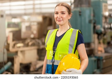 The Beautiful Engineer Woman Is Happy. Engineering Work, Working Smile In Heavy Industry.