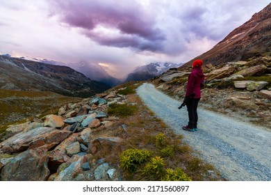 Beautiful evening light and storm cloudscape in the Swiss Alps