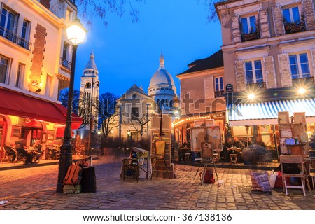Beautiful evening view of the Place du Tertre and the Sacre-Coeur in Paris, France