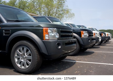 Beautiful And Expensive European Luxury SUV's Lined Up For Sale. Look In My Gallery For More Car Photos Like This.