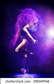 Beautiful expressive bellet dancer dancing at studio. Powder Photo Shoot.