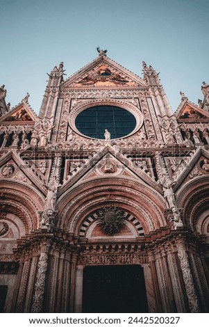 Beautiful Facade of Siena Cathedral in the evening light. Siena, Italy.