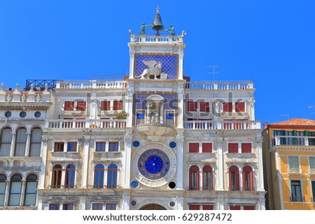 Beautiful facade of St Mark's Clocktower (Torre dell'Orologio) in Piazza San Marco, St Mark's Square, Venice, Italy