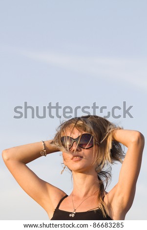 Similar – Young surfer woman with top and bikini kissing surfboard