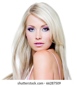 Beautiful face with saturated colors of make-up and straight long hair