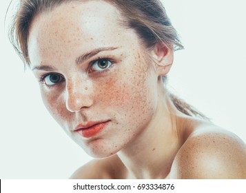 Beautiful face woman freckles and curly fly hair nice smile portrait