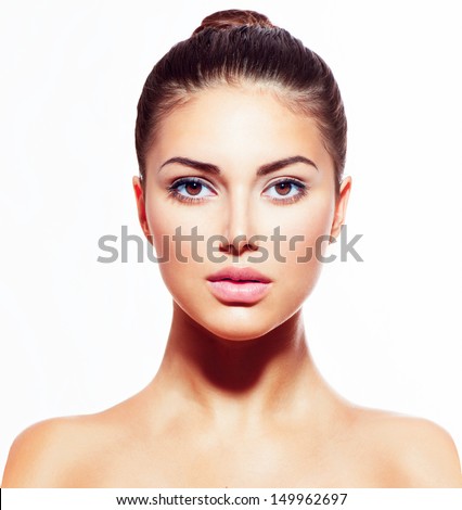 Beautiful Face of Young Woman with Clean Fresh Skin close up isolated on white. Beauty Portrait. Beautiful Spa Woman Smiling. Perfect Fresh Skin. Pure Beauty Model. Youth and Skin Care Concept 