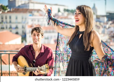 Beautiful Fado Singer Performing With Handsome Portuguese Guitarist Player