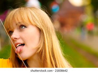 Beautiful Fair-haired Girl Licks Uvula White Wire.