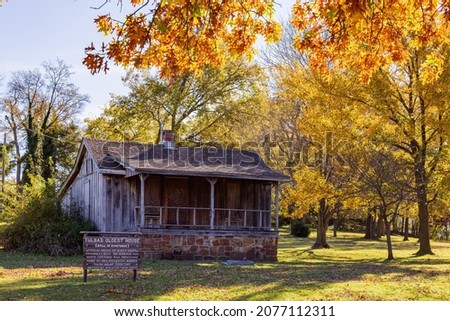 Beautiful fall color with the Tulsa's Oldest house at Oklahoma