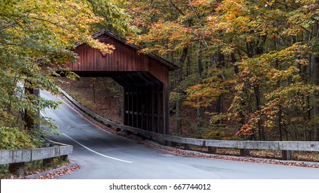 Beautiful Fall Colors At Covered Bridge On A Scenic Drive In Traverse City, Michigan